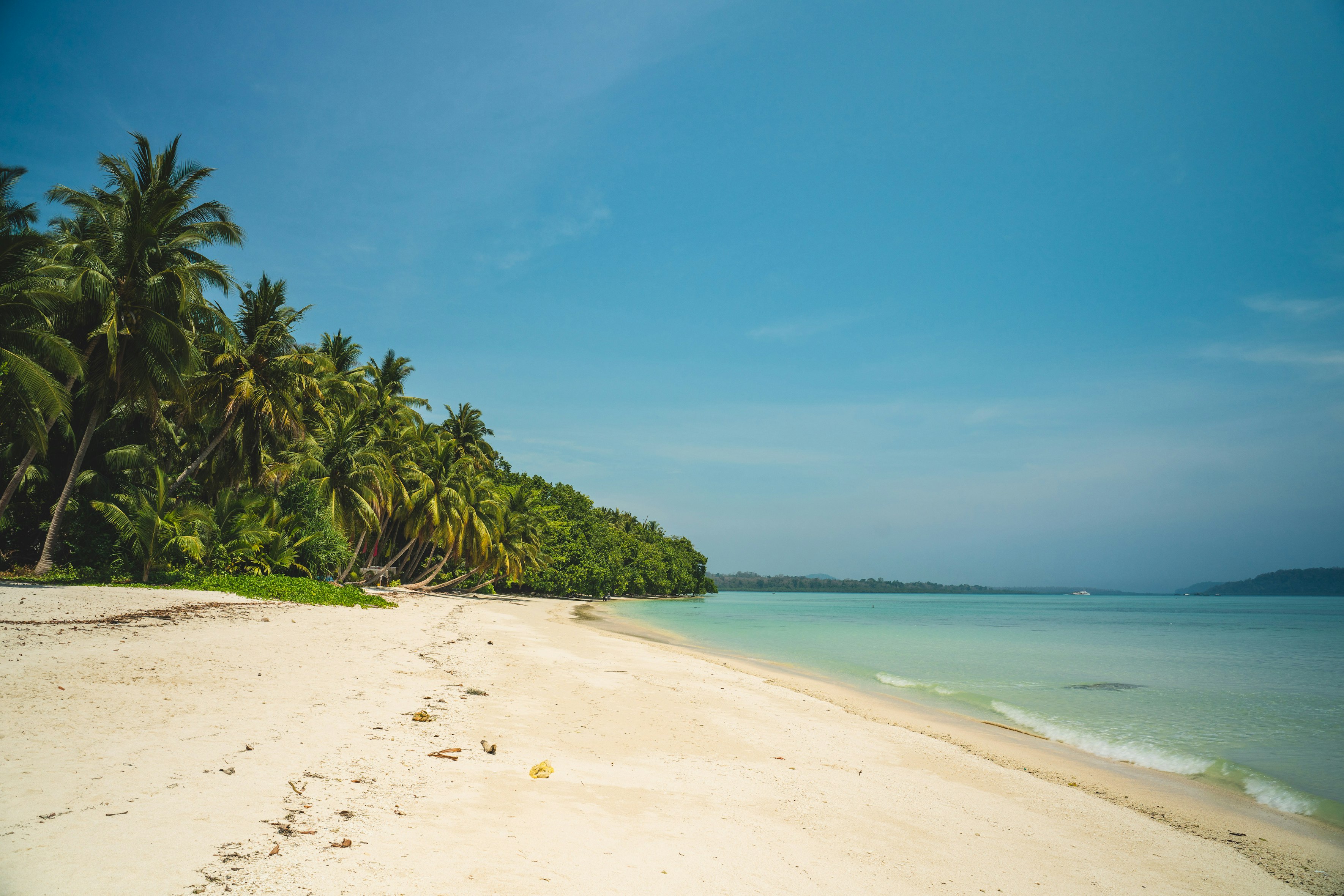 White sandy beach with turquoise water.