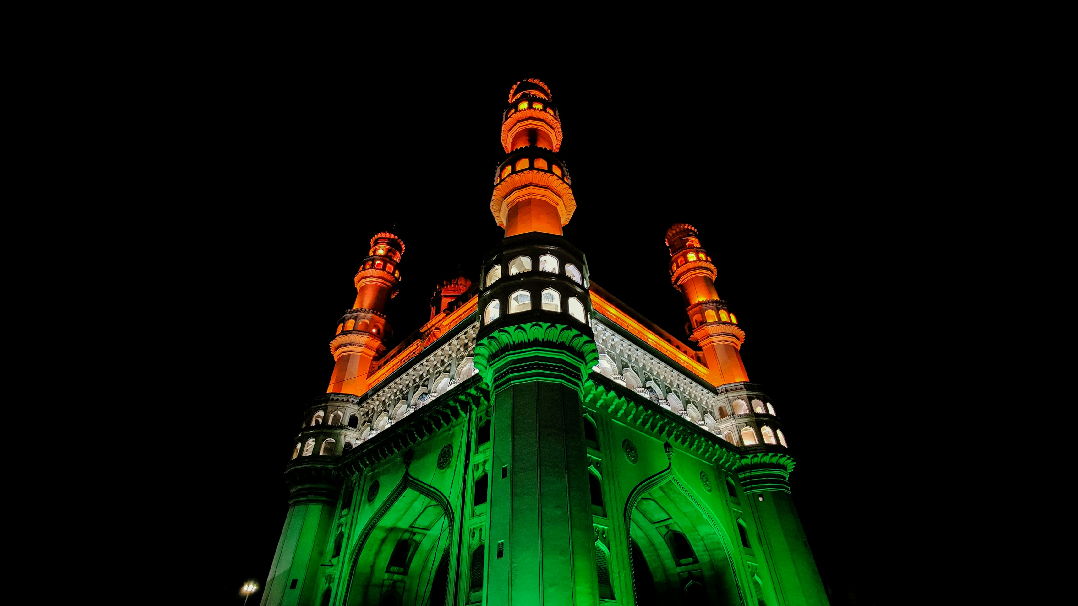 The iconic Charminar glowing under night lights in Hyderabad
